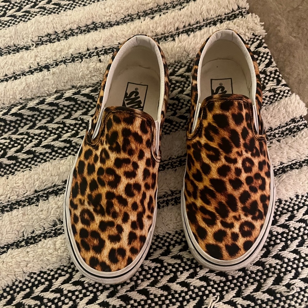 Very gently used Vans slip one.  Size 8.  Animal print.